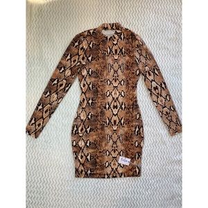 SNAKE DRESS NOW AVAILABLE IN SIZES XS, S, M, L